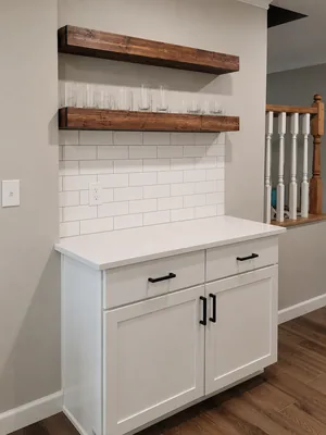 Custom shelving and built-ins by KNA Remodeling